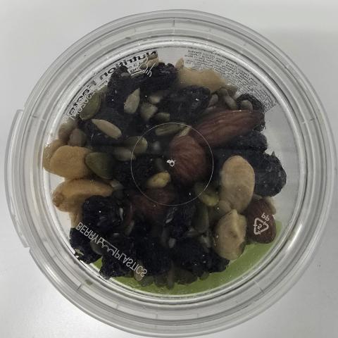 Image 3: “Photograph of top view of incorrect product firm identified as Healthy Trails Mix”